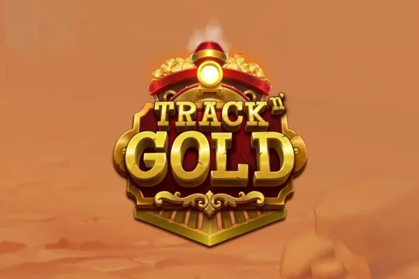 Rødt og gull lokomotivfront fylt med gullklumper bak logoen Track n' Gold (Play'n GO) på en støvete oransje ørkenbakgrunn.